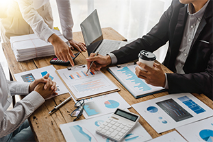 Three Business Adviser Meeting To Analyze And Discuss The Situation On The Financial Report In The Meeting Room.investment Consultant,financial Consultant,financial Advisor And Accounting Concept.