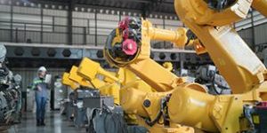 Tech Industry. Business Industry Technology, People And Tech. Engineer Working In Factory.